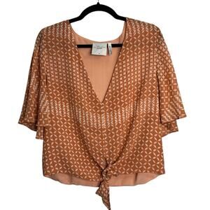 L’academie Revolve Orange Geometric Print Flutter Sleeve Tie Front Blouse